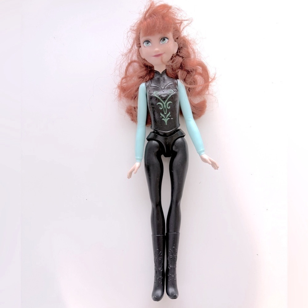 Hasbro Walt Disney Anna wearing a sleek teal black outfit